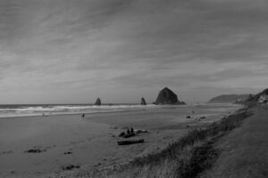 A panoramic photograph of Cannon Beach, Oregon, and its Haystack Rock by Gary Quay
