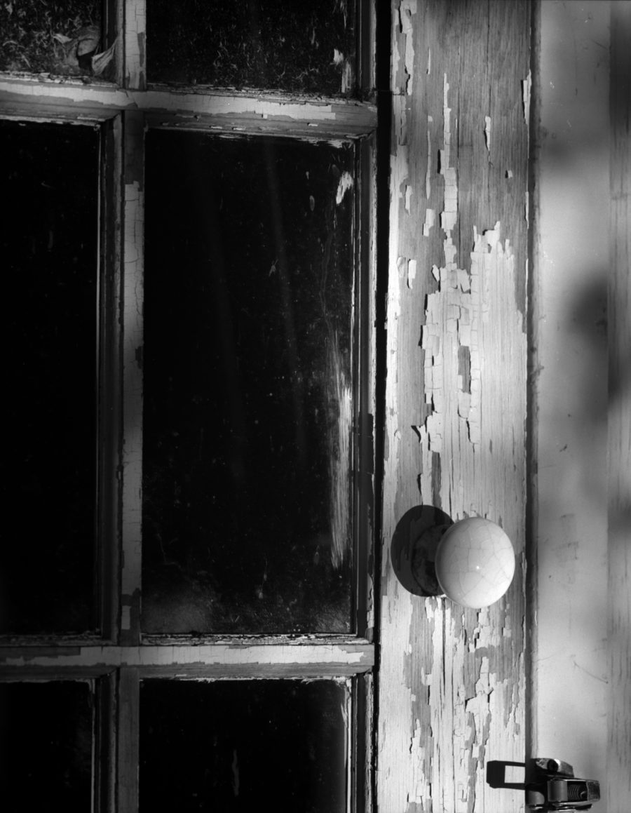 An oll shed with a white knob in Potsdam, NY by Gary Quay